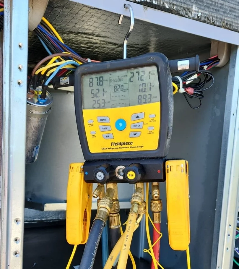 HVAC digital manifold gauge testing pressure on a system